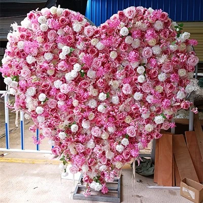 Parede de flor de coração rosa